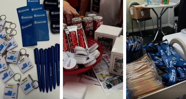 Reklamní předměty na stáncích Career Expo: propisky, přívěsky, energetické nápoje, tyčinky a šňůrky na krk